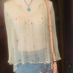 Shear, flowing bling Free People top.